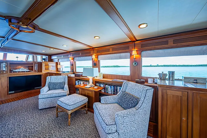Slide: The Image of Luxurious interior of 2014 Marlow 80 Explorer yacht with elegant seating and scenic views. - 17