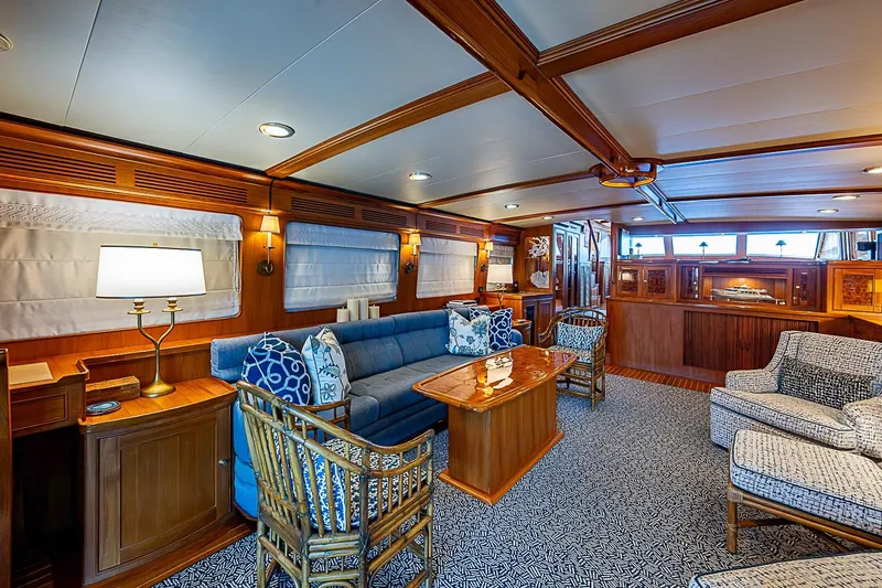 Slide: The Image of Luxurious interior of 2014 Marlow 80 Explorer yacht with elegant wood finishes and plush seating. - 19