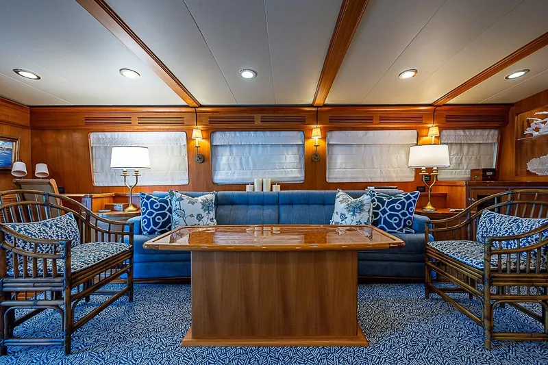 Slide: The Image of Luxurious interior of 2014 Marlow 80 Explorer yacht with elegant seating and wooden accents. - 23