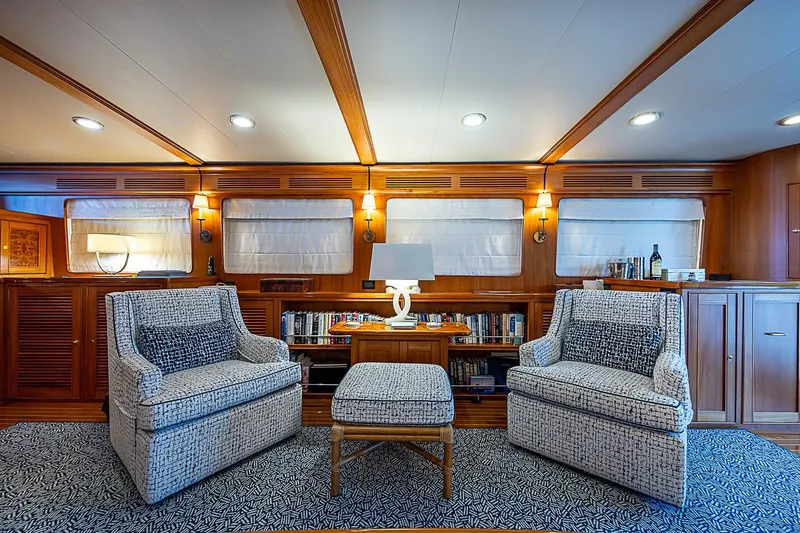 Slide: The Image of Luxurious interior of 2014 Marlow 80 Explorer yacht with elegant seating and wooden accents. - 24