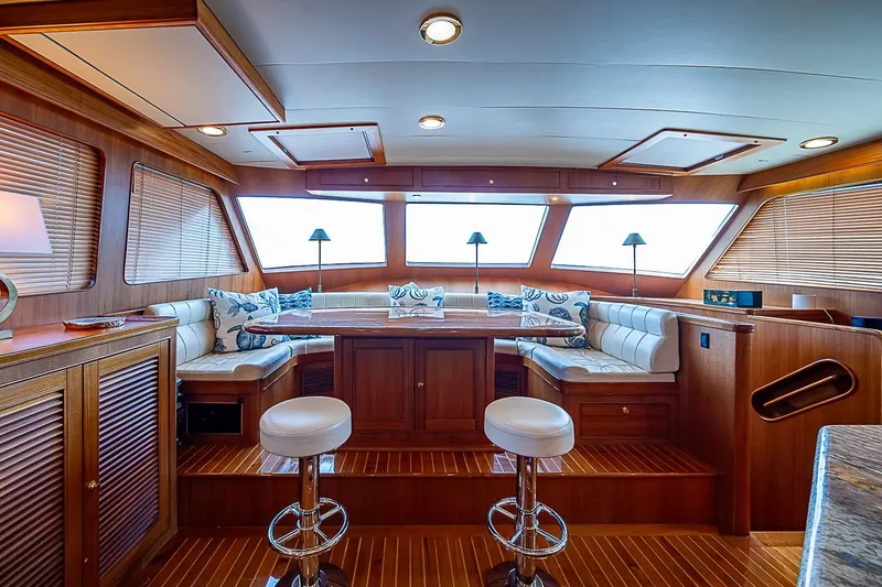Slide: The Image of Luxurious interior of 2014 Marlow 80 Explorer yacht with elegant seating and wooden finishes. - 32