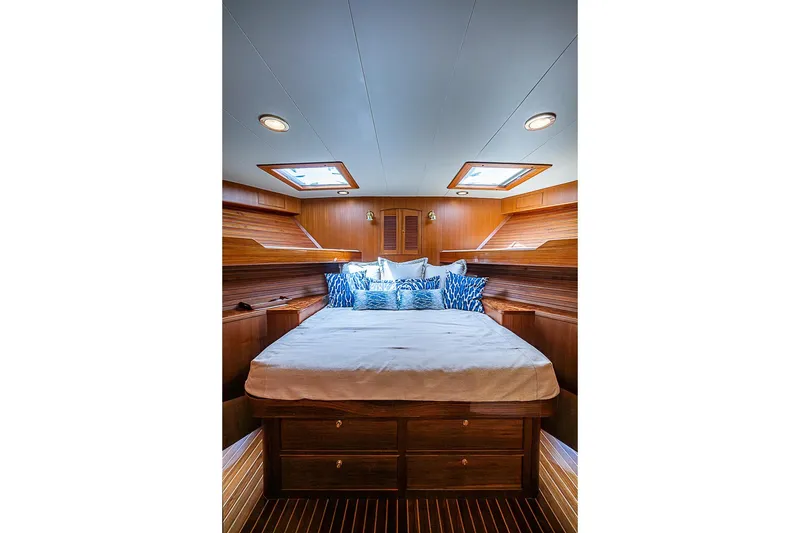 Slide: The Image of Luxurious cabin interior of 2014 Marlow 80 Explorer yacht with elegant wood finish. - 48