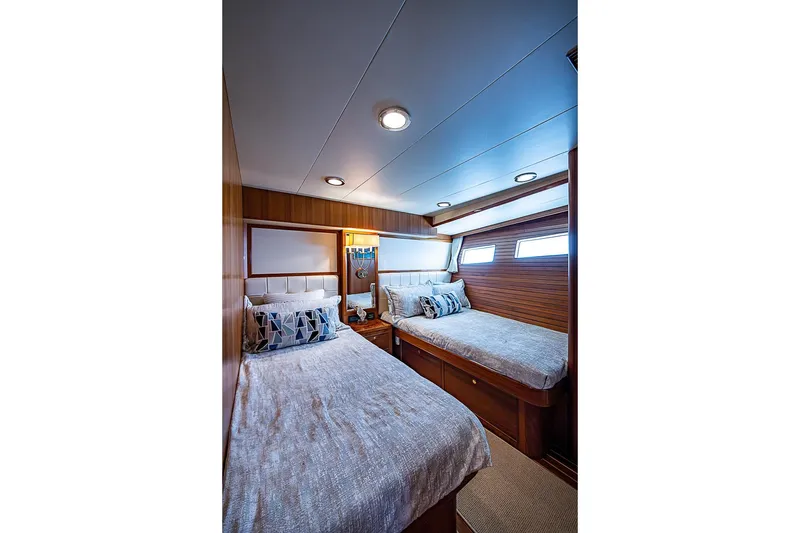 Slide: The Image of Interior cabin of 2014 Marlow 80 Explorer yacht with twin beds and modern decor. - 52