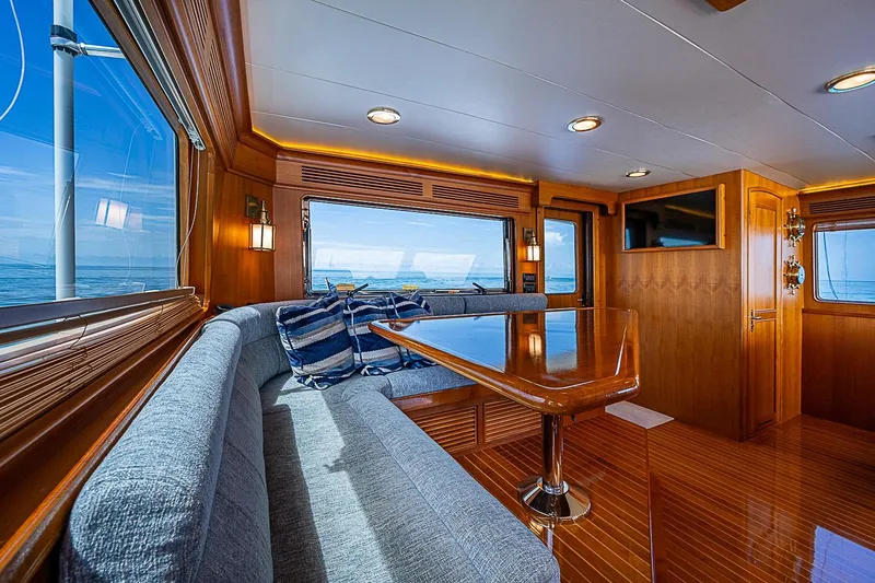 Slide: The Image of Luxurious interior of 2014 Marlow 80 Explorer yacht with elegant wood finishes and ocean views. - 8