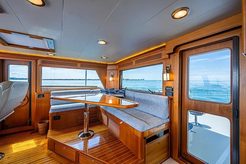 Slide: The Image of Luxurious interior of 2014 Marlow 80 Explorer yacht with ocean view and elegant wood finish. - 9