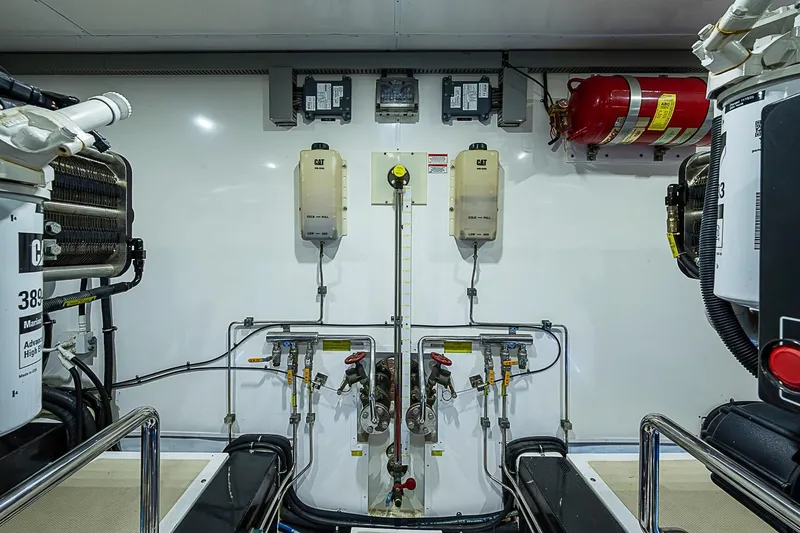 Slide: The Image of Engine room of 2014 Marlow 80 Explorer yacht with CAT machinery and fire suppression system. - 91