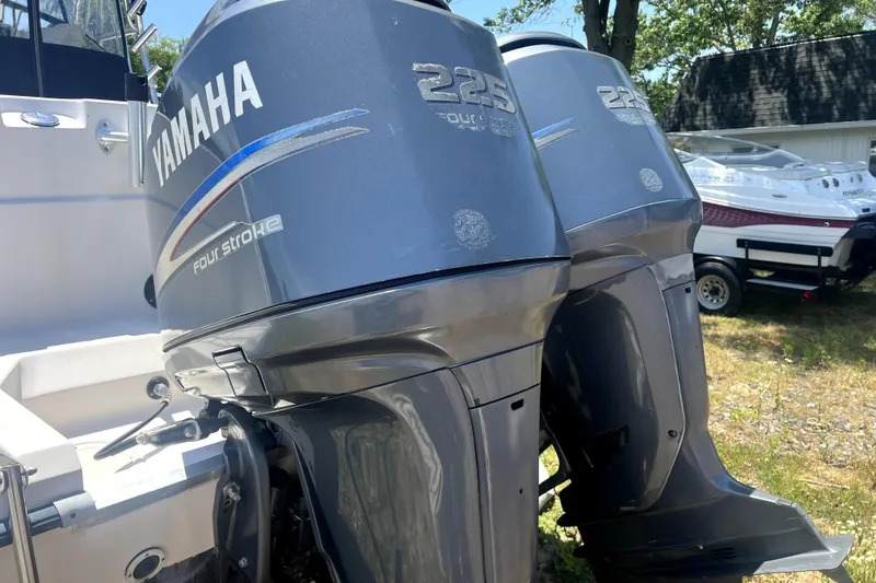 Slide: The Image of Twin Yamaha 225 outboard engines on a 2002 Grady-White Marlin 300 boat. - 18