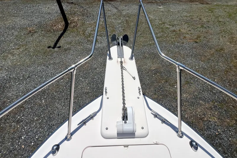 Slide: The Image of Bow view of 2002 Grady-White Marlin 300 boat with anchor chain and railings. - 6