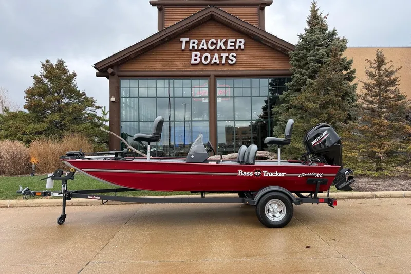 The Image of 2026 Tracker Bass Tracker Classic XL boat displayed outside Tracker Boats store. - 0