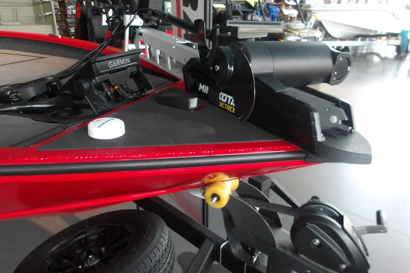 Slide: The Image of Red 2026 Tracker Savage 215 boat with Garmin and Minn Kota Ultrex equipment. - 13