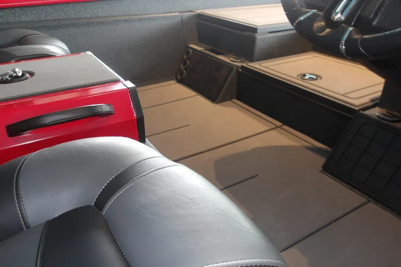 Slide: The Image of Interior of 2026 Tracker Savage 215 boat with sleek seating and modern dashboard design. - 20