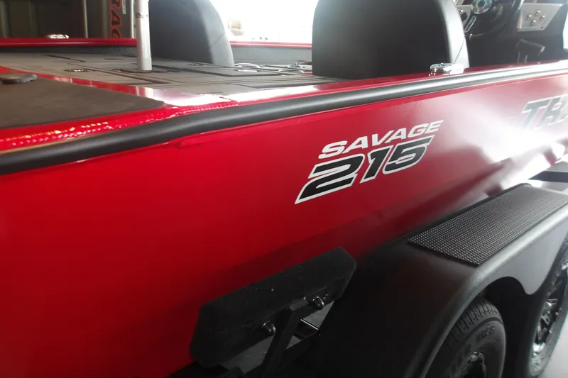 The Image of 2026 Tracker Savage 215 boat, red exterior, close-up view. - 2