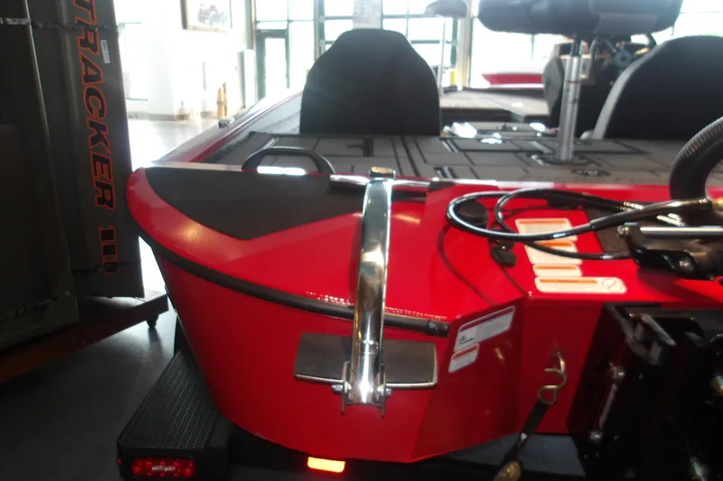 Slide: The Image of Red 2026 Tracker Savage 215 boat interior with sleek design and modern features. - 6