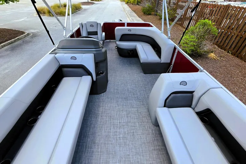 Slide: The Image of 2026 Sun Tracker Party Barge 18 DLX interior with spacious seating and modern design. - 14