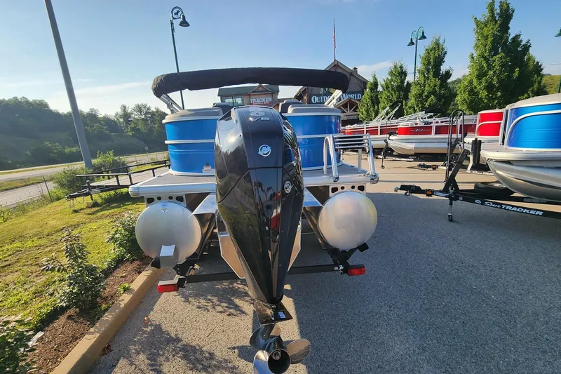 Slide: The Image of 2026 Sun Tracker Party Barge 22 XP3 pontoon boat with powerful outboard motor. - 2