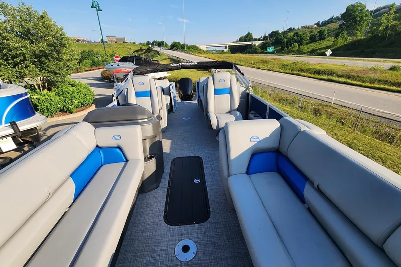 Slide: The Image of 2026 Sun Tracker Party Barge 22 XP3 pontoon boat with spacious seating and modern design. - 4