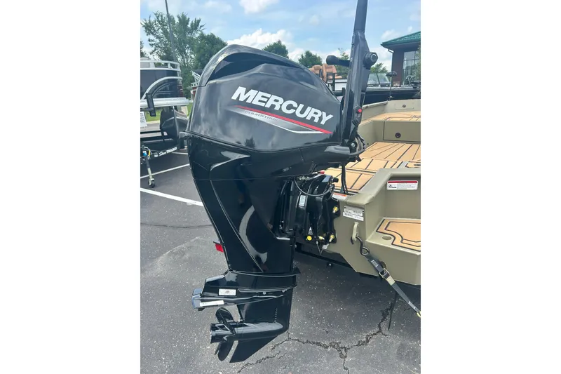 Slide: The Image of 2026 Tracker Grizzly 1650 T Prairie Wings Edition with Mercury outboard motor. - 6