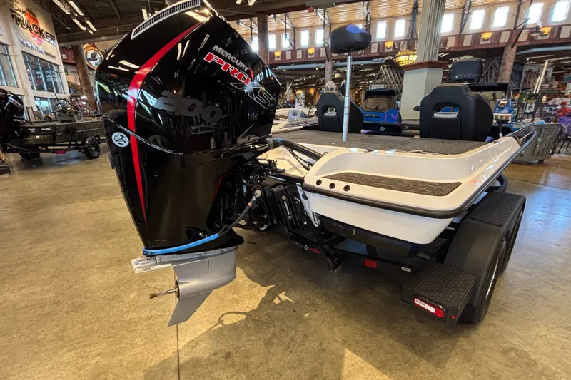Slide: The Image of 2026 Nitro Z19 XL Pro boat with Mercury Pro XS engine in showroom. - 6