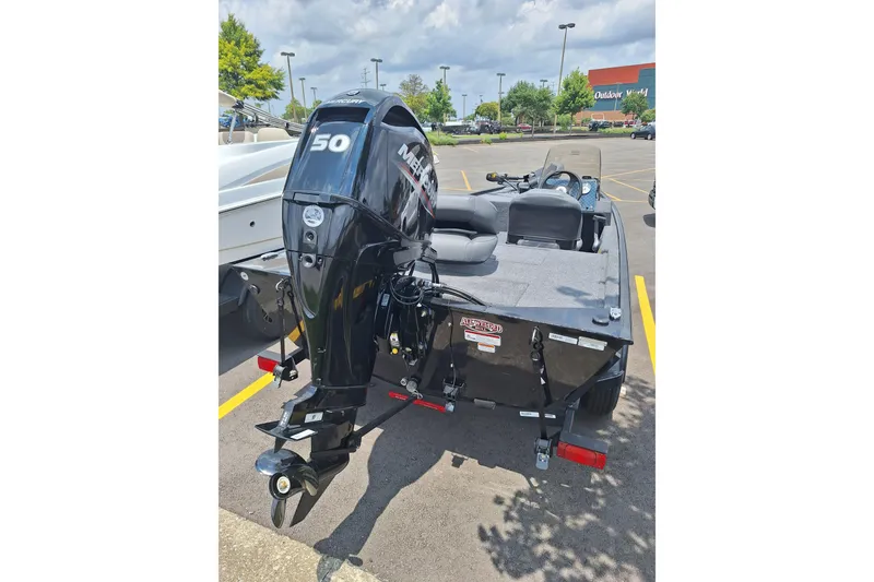 Slide: The Image of 2026 Tracker Bass Tracker Classic XL boat with Mercury 50 HP engine in parking lot. - 4
