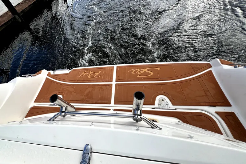 Slide: The Image of Rear view of a 2007 Sea Ray Sundancer 310 boat on water. - 20