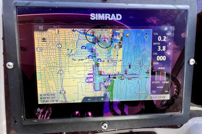 Slide: The Image of Simrad GPS display on 2007 Sea Ray Sundancer 310, showing nautical map and navigation data. - 24