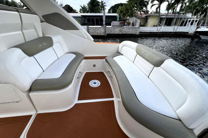 Slide: The Image of Luxurious seating area on a 2007 Sea Ray Sundancer 310 boat by the water. - 52