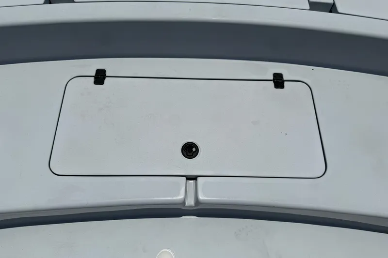 Slide: The Image of 2017 Yellowfin 24 Bay CE boat hatch with secure latch and sleek design. - 11