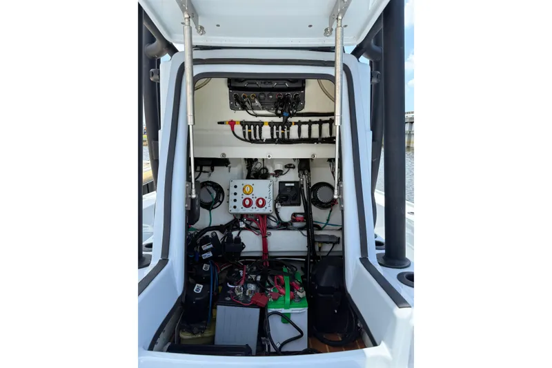 Slide: The Image of 2017 Yellowfin 24 Bay CE boat interior wiring and equipment setup. - 21
