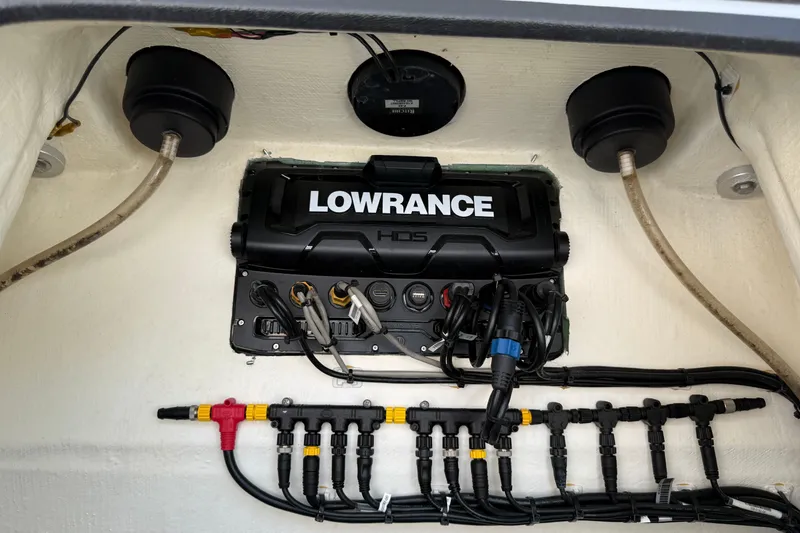 Slide: The Image of Lowrance HDS system in 2017 Yellowfin 24 Bay CE boat, showcasing wiring and connections. - 25
