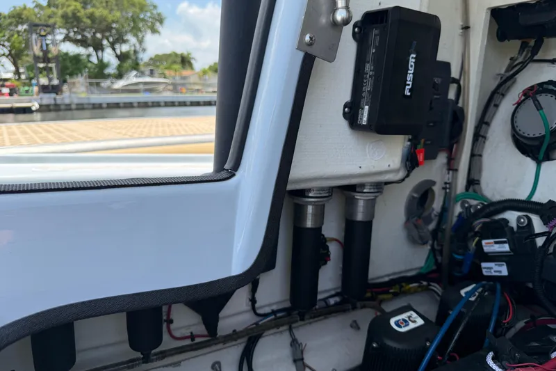 Slide: The Image of Interior view of a 2017 Yellowfin 24 Bay CE boat showing electronic components and wiring. - 28