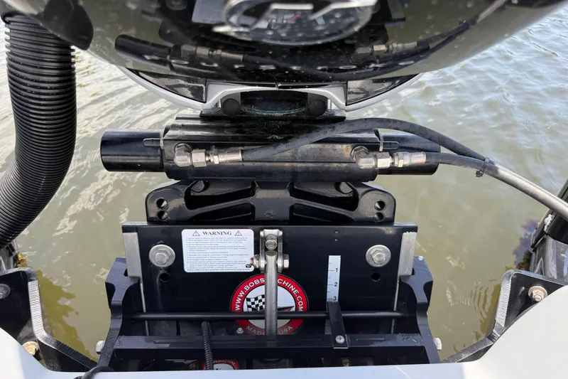 Slide: The Image of Close-up of 2017 Yellowfin 24 Bay CE boat engine mount and hydraulic system. - 67