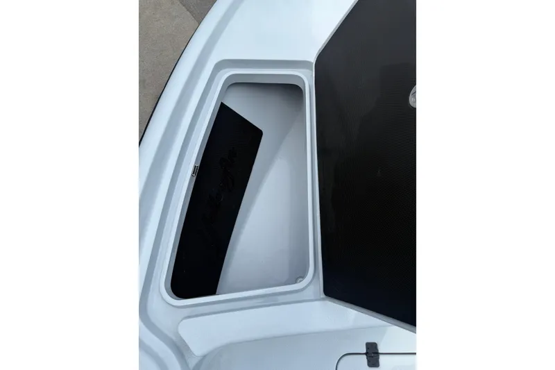 Slide: The Image of Storage compartment of 2017 Yellowfin 24 Bay CE boat, open and empty. - 72