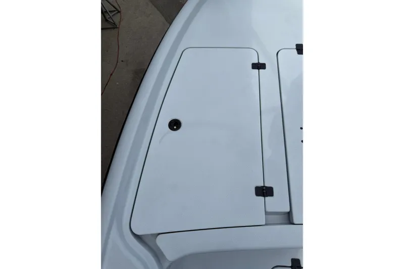 Slide: The Image of 2017 Yellowfin 24 Bay CE boat deck with storage compartment. - 73