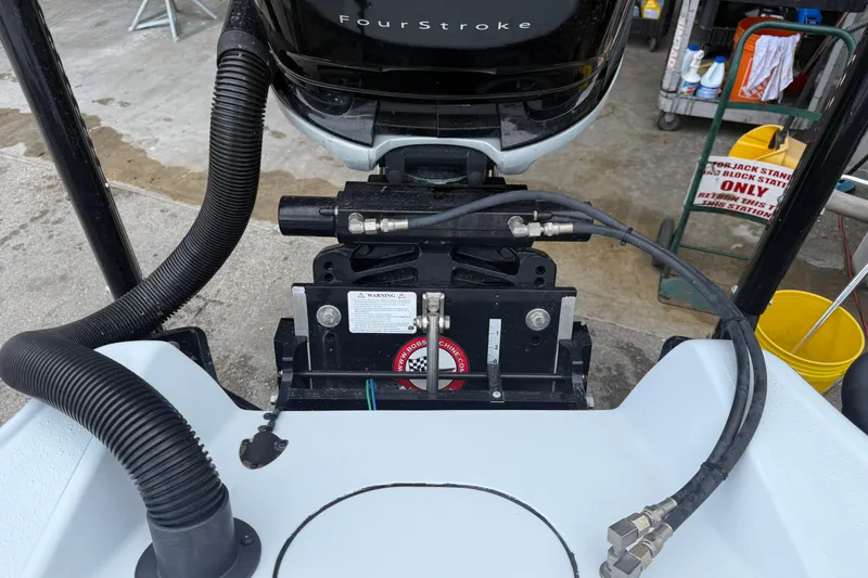 Slide: The Image of 2017 Yellowfin 24 Bay CE boat engine and hydraulic system close-up. - 86