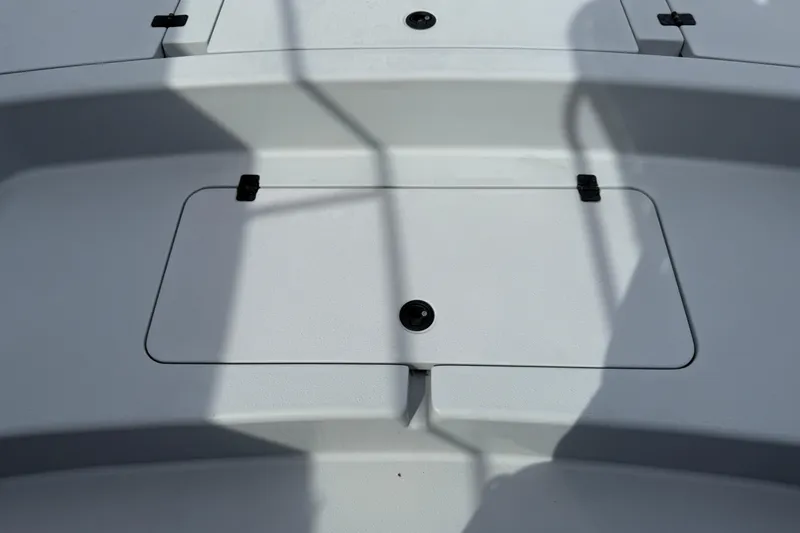 Slide: The Image of 2017 Yellowfin 24 Bay CE boat deck with storage compartment. - 87