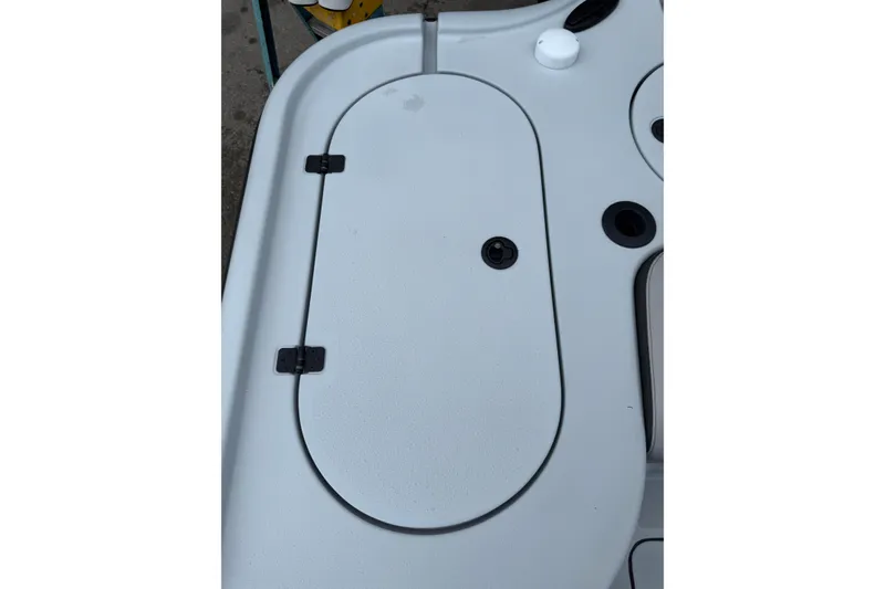 Slide: The Image of 2017 Yellowfin 24 Bay CE boat hatch with hinges and latch. - 90
