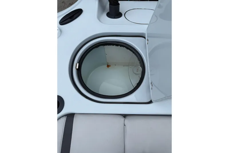 Slide: The Image of Open storage compartment on 2017 Yellowfin 24 Bay CE boat. - 92