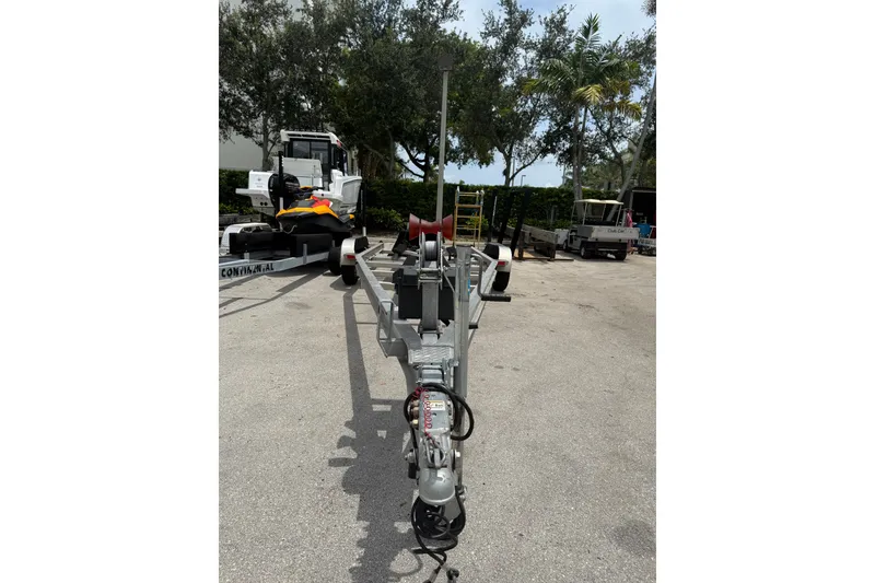 Slide: The Image of Trailer for 2017 Yellowfin 24 Bay CE boat in outdoor setting. - 99