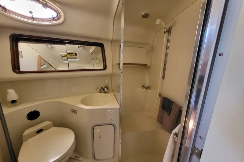 Slide: The Image of Bathroom interior of 1995 Sea Ray Sundancer 370 yacht with shower and sink. - 18