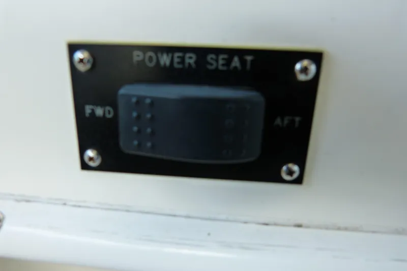 Slide: The Image of Power seat control switch on 1995 Sea Ray Sundancer 370 boat dashboard. - 39
