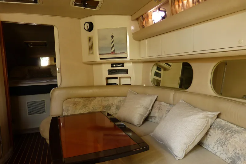 Slide: The Image of Interior of 1995 Sea Ray Sundancer 370 yacht with cozy seating and elegant decor. - 43