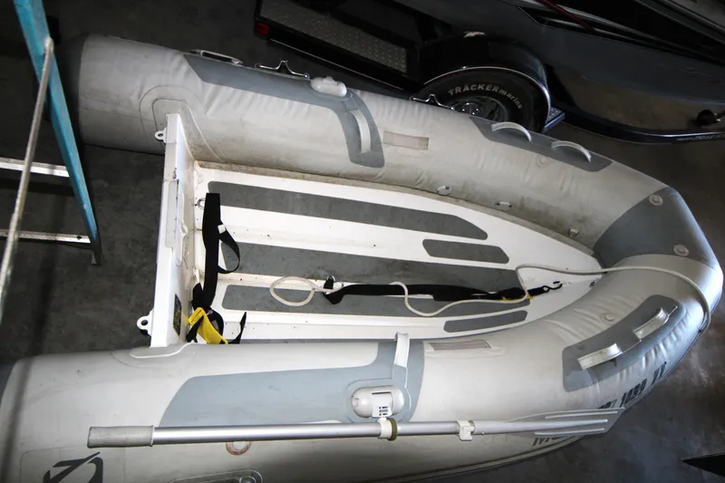 Slide: The Image of Inflatable dinghy in storage, associated with 2013 Ranger Tugs R-31 CB. - 50