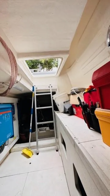 Slide: The Image of Interior of 2022 Greenline 48 Flybridge yacht, featuring storage and equipment. - 37