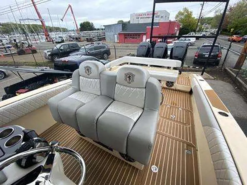 Slide: The Image of 2013 Statement 38 SUV Open boat interior with luxury seating and wooden deck. - 5