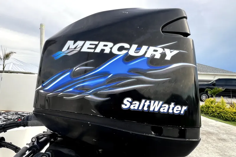 Slide: The Image of Mercury SaltWater engine on a 1998 Boston Whaler 230 Outrage boat. - 10