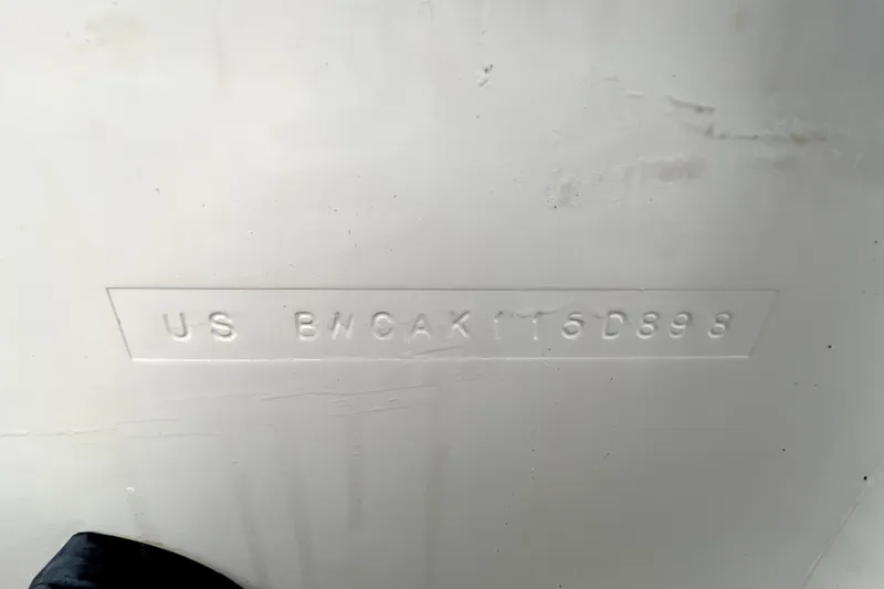 Slide: The Image of Hull identification number on 1998 Boston Whaler 230 Outrage boat. - 13