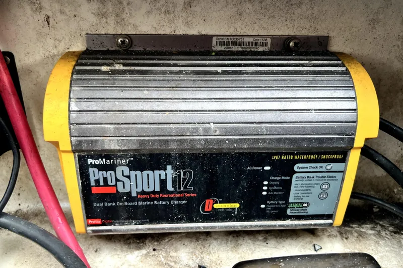 Slide: The Image of ProMariner ProSport 12 marine battery charger on 1998 Boston Whaler 230 Outrage boat. - 31