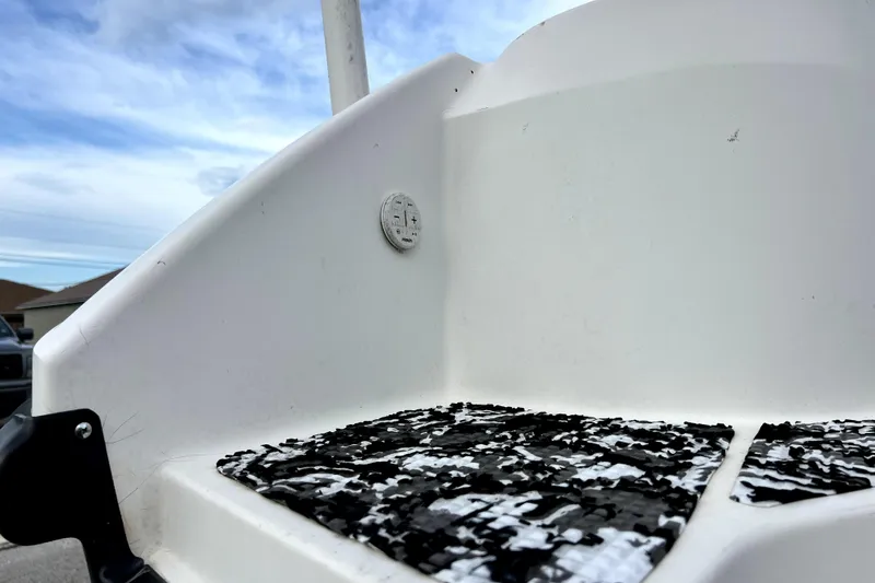 Slide: The Image of Close-up of 1998 Boston Whaler 230 Outrage boat interior with textured flooring. - 47