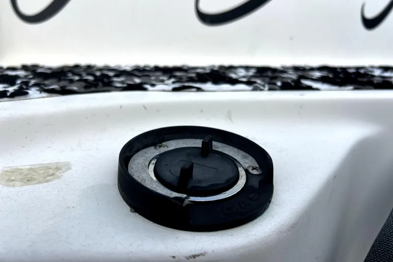 Slide: The Image of Fuel cap on a 1998 Boston Whaler 230 Outrage boat. - 75