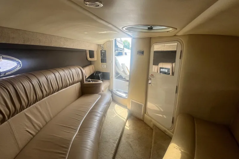Slide: The Image of Luxurious interior of a 2007 Cobalt 343 boat, featuring plush seating and elegant design. - 21